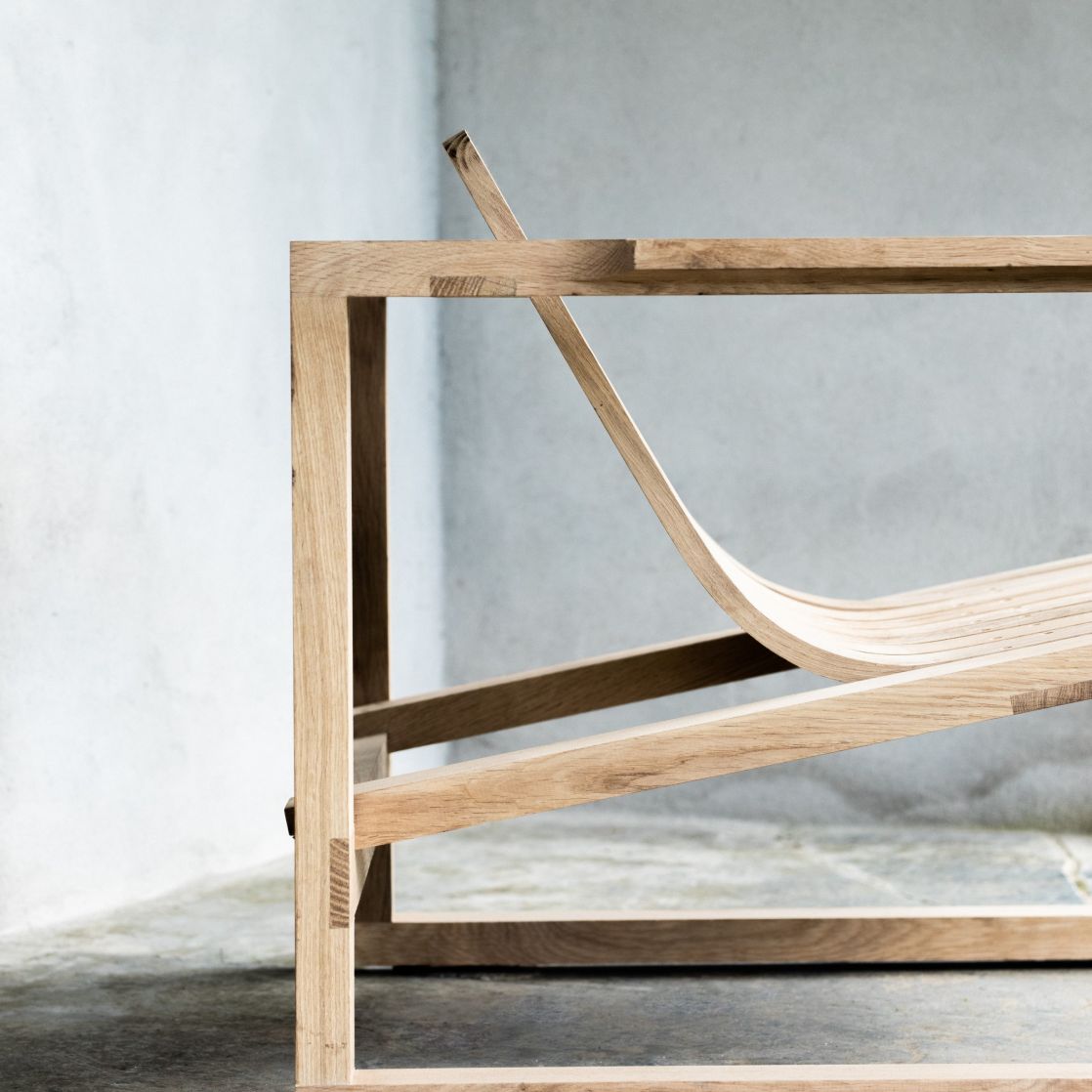 Side profile of steam bent chair showing ergonomic contemporary lines