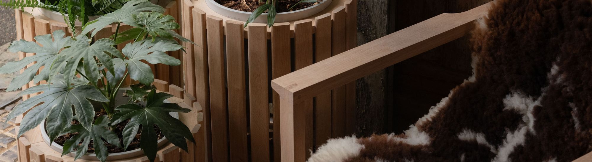 3 wooden planters and an wooden chair