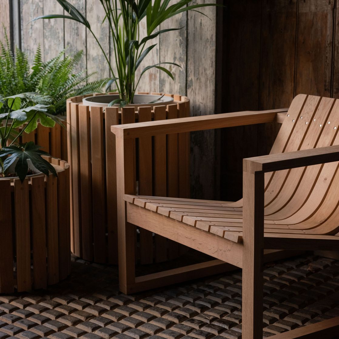 wooden planters and wooden chair