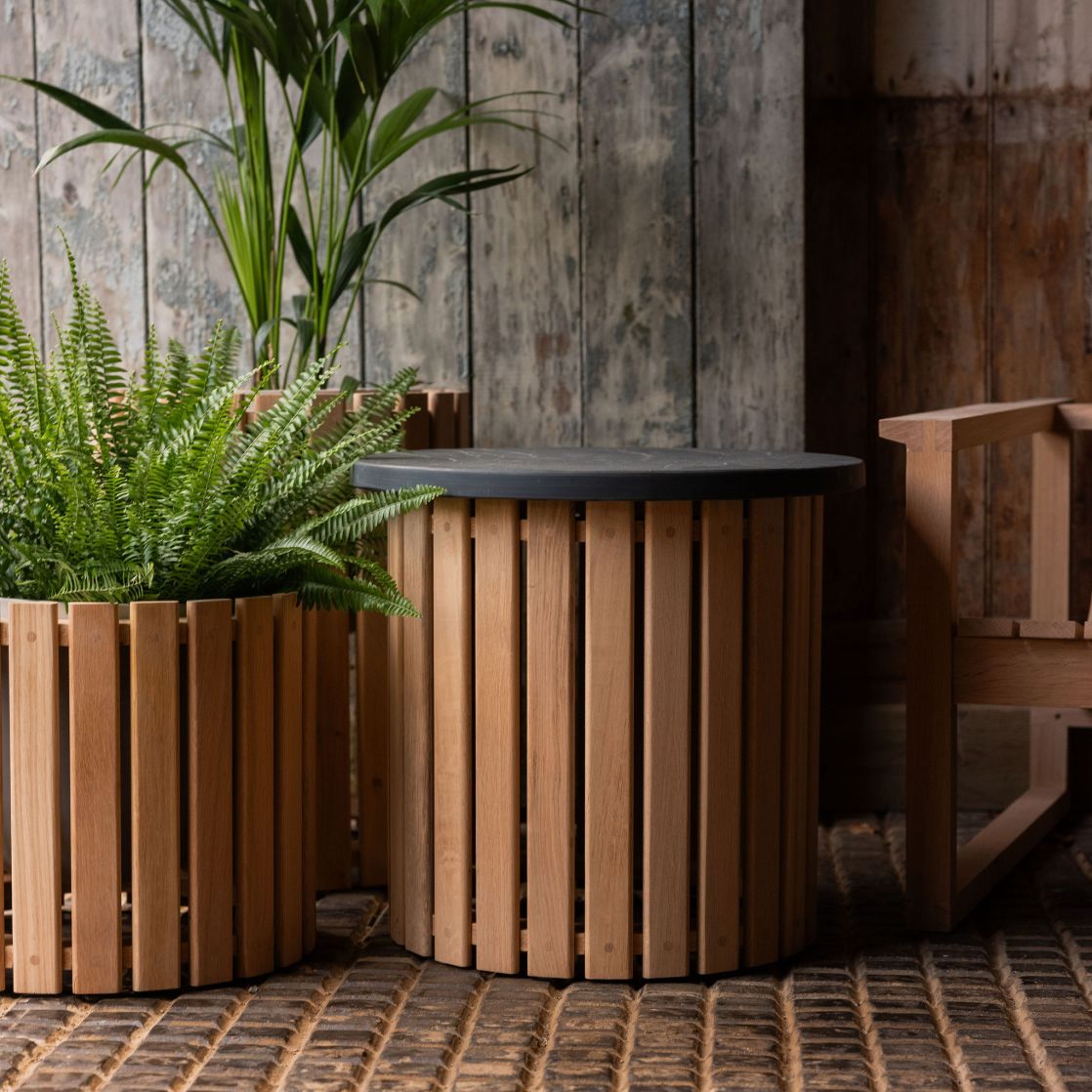 wooden planters and wooden chair