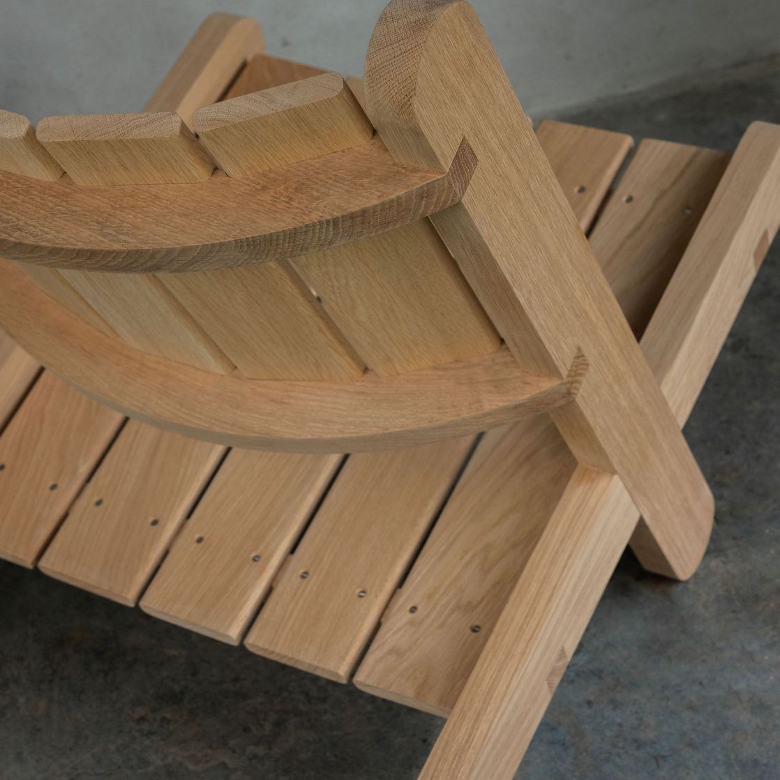 a wooden outdoor chair