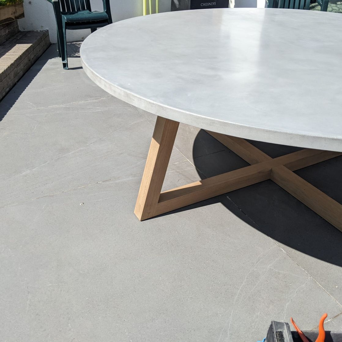 Concrete table with oak base - bespoke furniture design