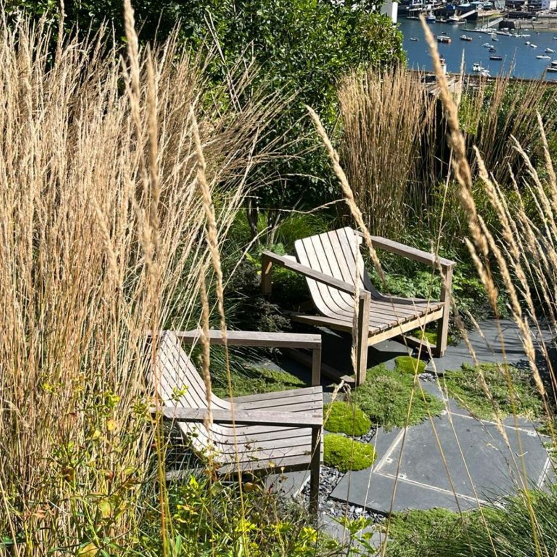 Huers Chairs in wild garden setting - outdoor sustainable furniture