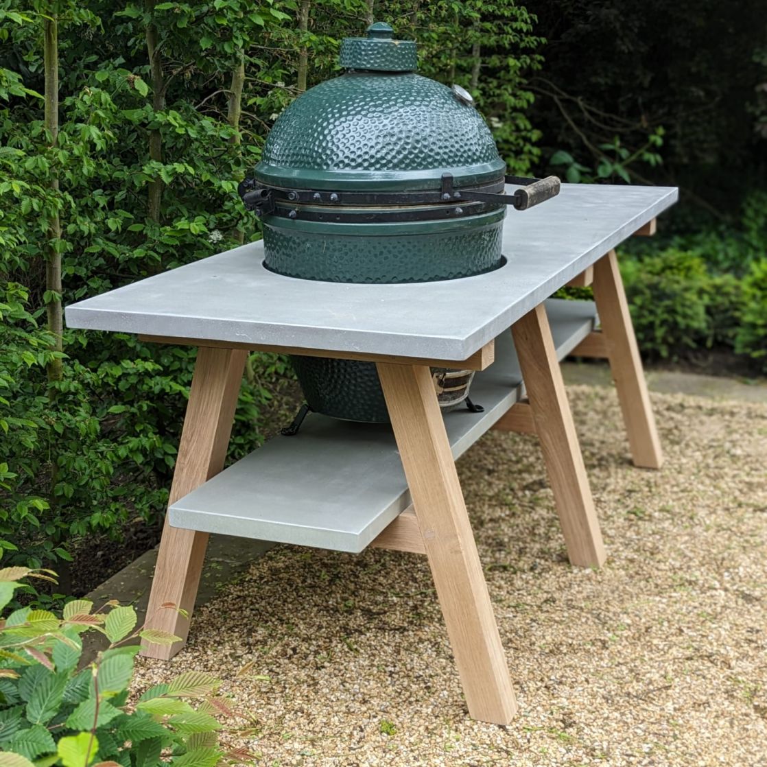 A side profile view of the Outdoor Kitchen featuring Big Green Egg