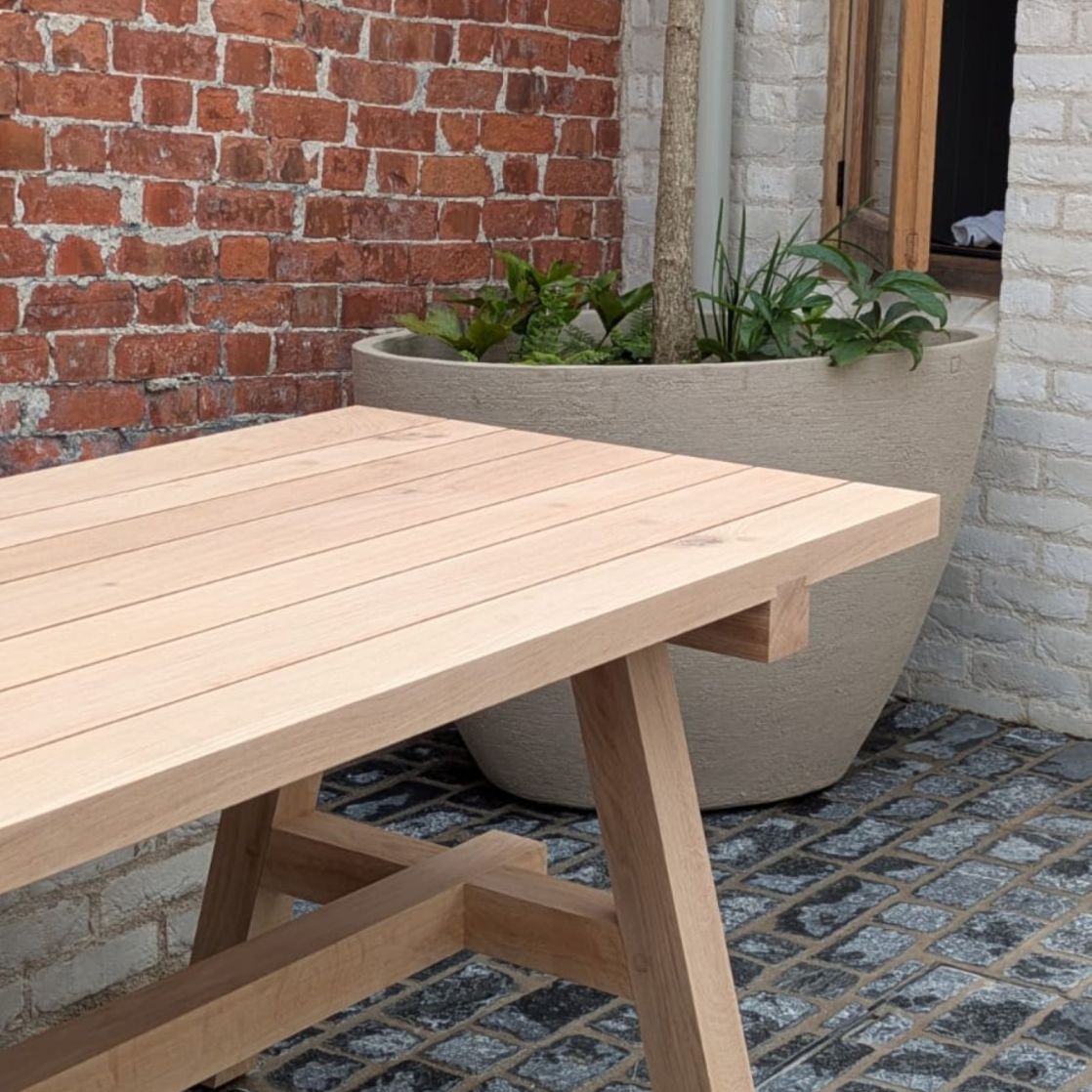 Outdoor dining table handmade using traditional joinery methods